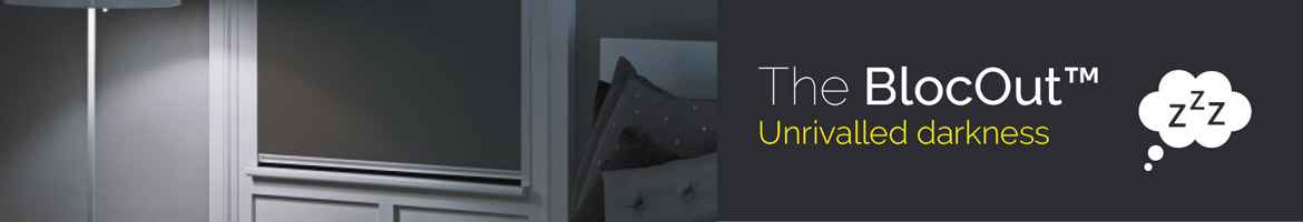 Grey blocout blind in bedroom with motto unrivalled darkness